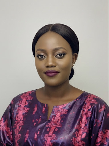 Annet N. Kaweesa — Founder & Director